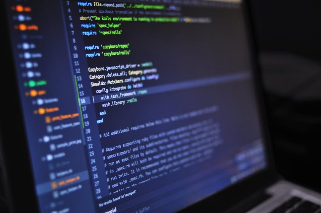 Laptop screen showing software coding